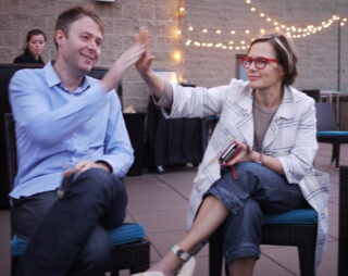 David jen David Eaves high-fiving Jen Pahlka
